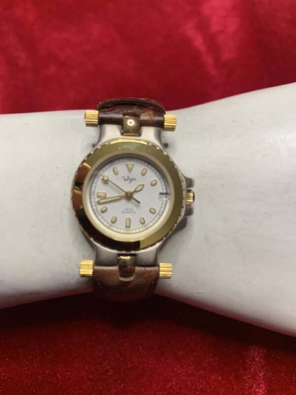 RELOJ; «VOGA» HOMBRE BISEL DORADO CON PULSERA DE CUERO