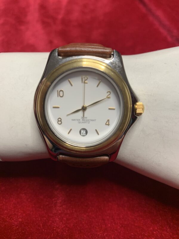 RELOJ; «THERMIDOR» HOMBRE BISEL DORADO Y PULSERA DE CUERO