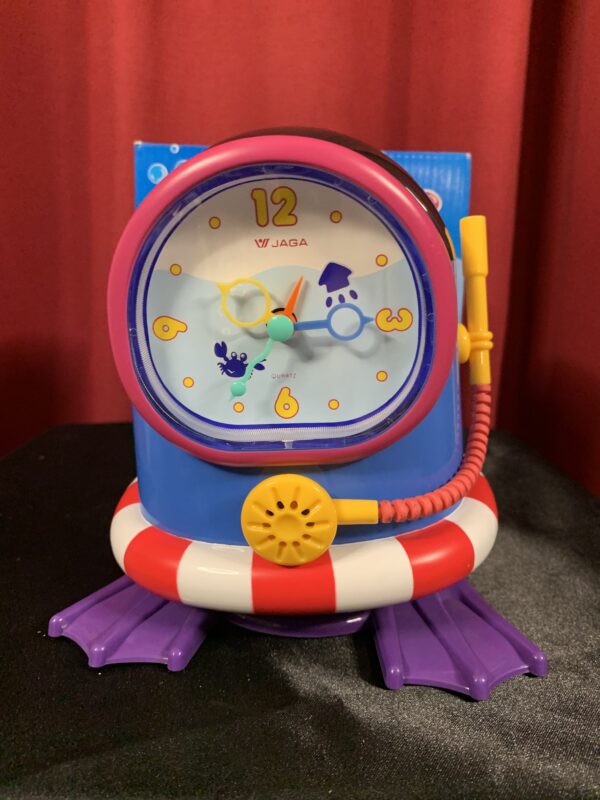 RELOJ;  DESPERTADOR INFANTIL MUSICAL CON MOVIMIENTO SUBMARINISTA